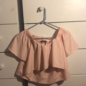 Wasn’t school appropriate. Comes off shoulders.